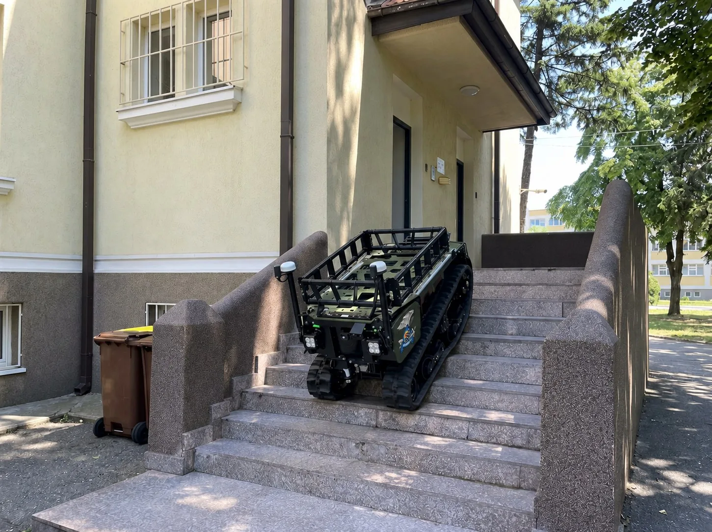 MAX1 carrying a payload rack up an outdoor staircase